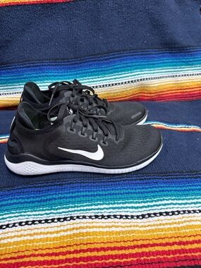 Nike Men’s Black Athletic Shoes with White Swoosh
